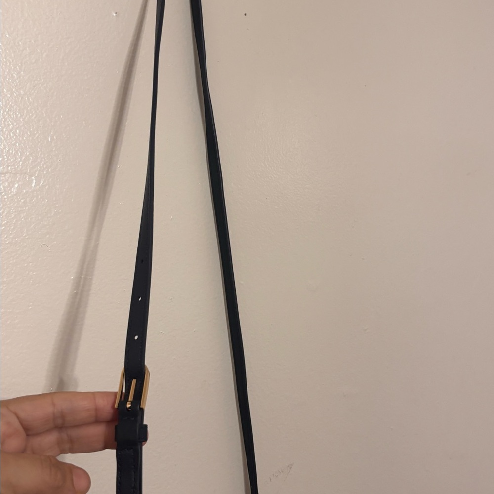 “Tory Burch Fleming Suede Fringe Crossbody Bag – Navy Blue”

• - Picture 3 of 10